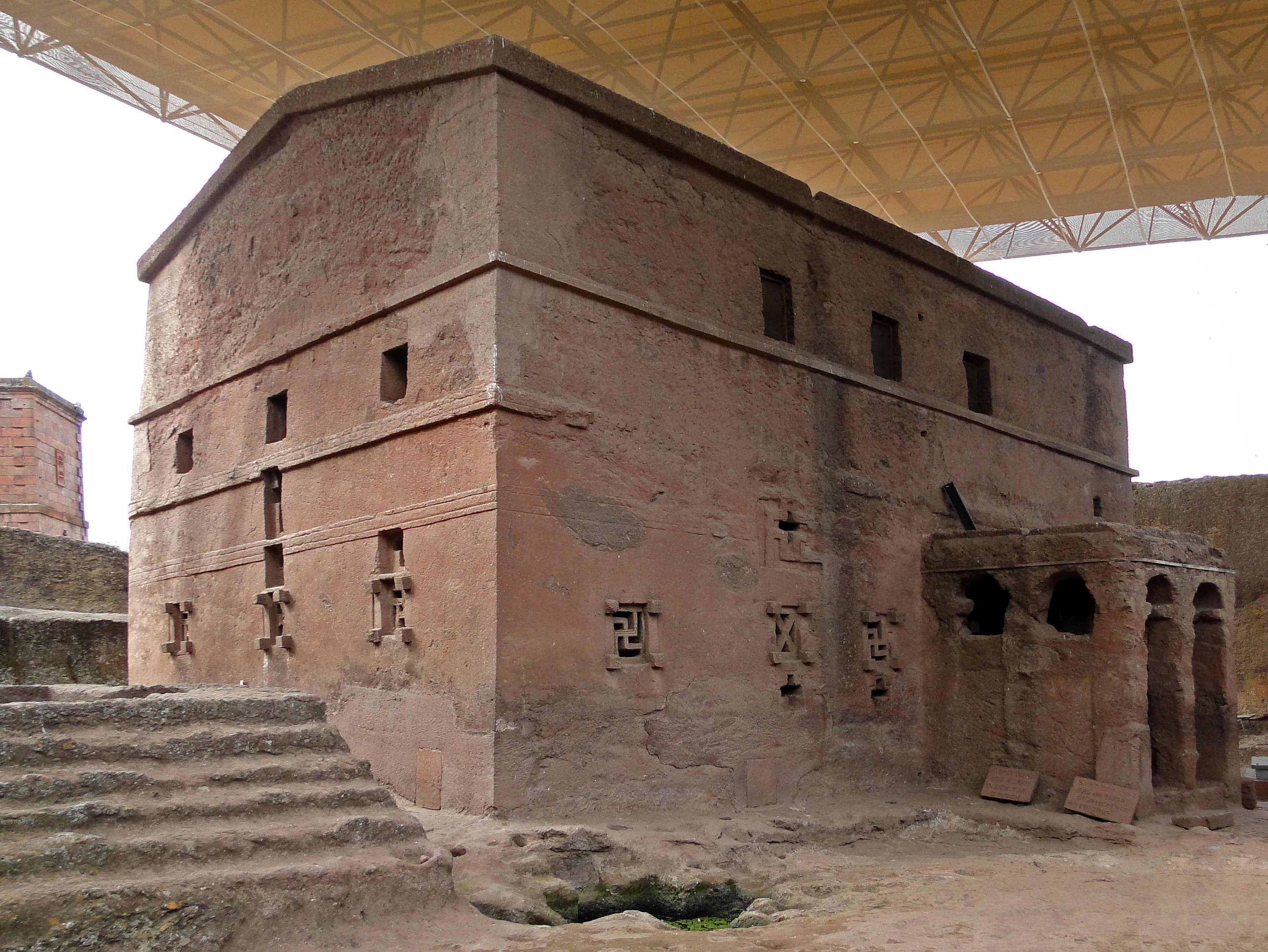 Rock-hewn church courtyard and facade of Biete Maryam in Lalibela, Ethiopia.